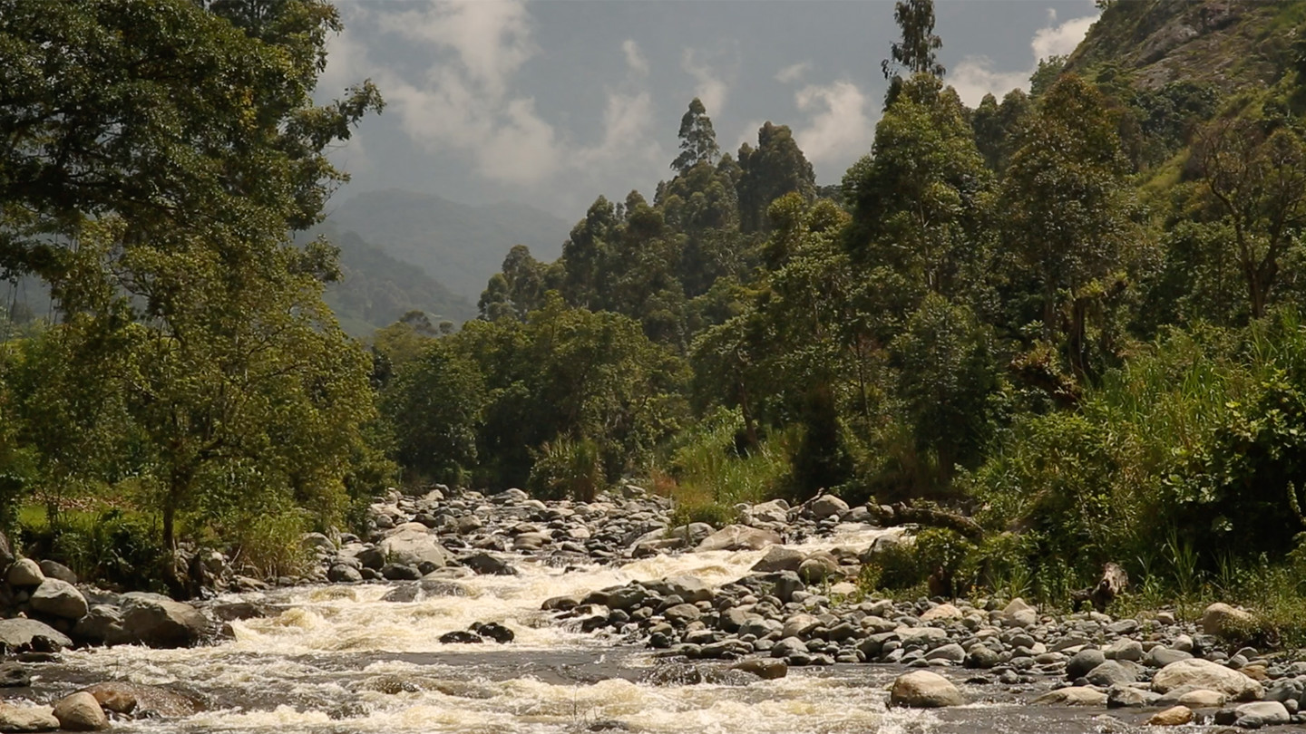 river running over rocks image
